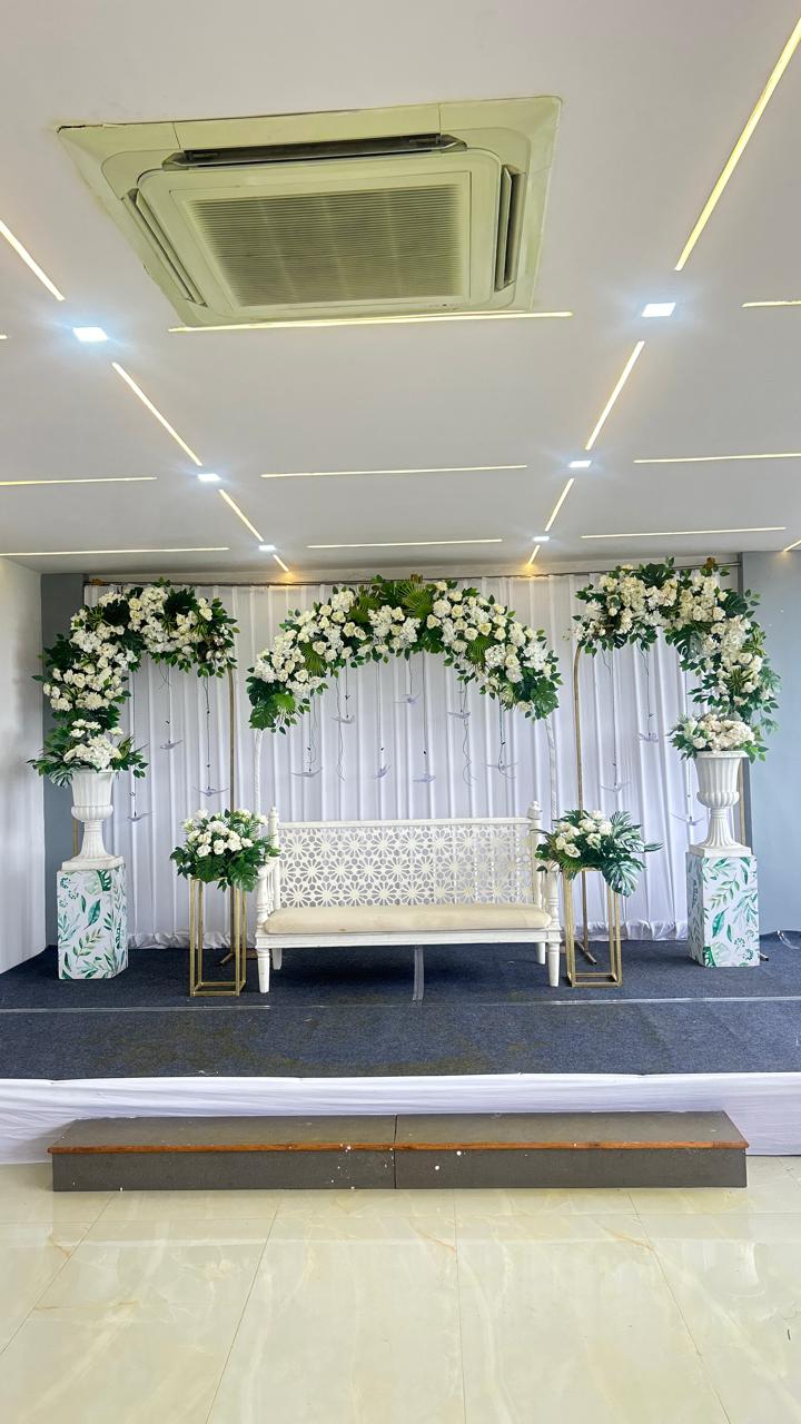 White floral bench stage