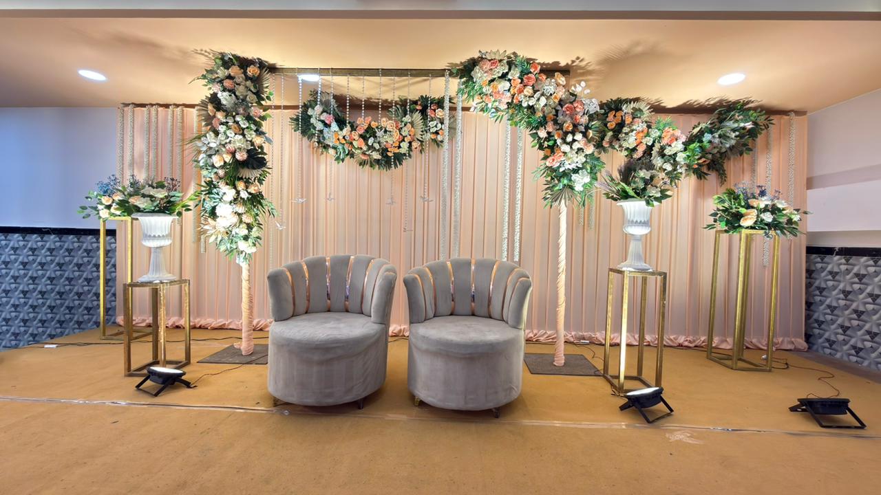 Elegant floral wedding stage at Royal Celebration