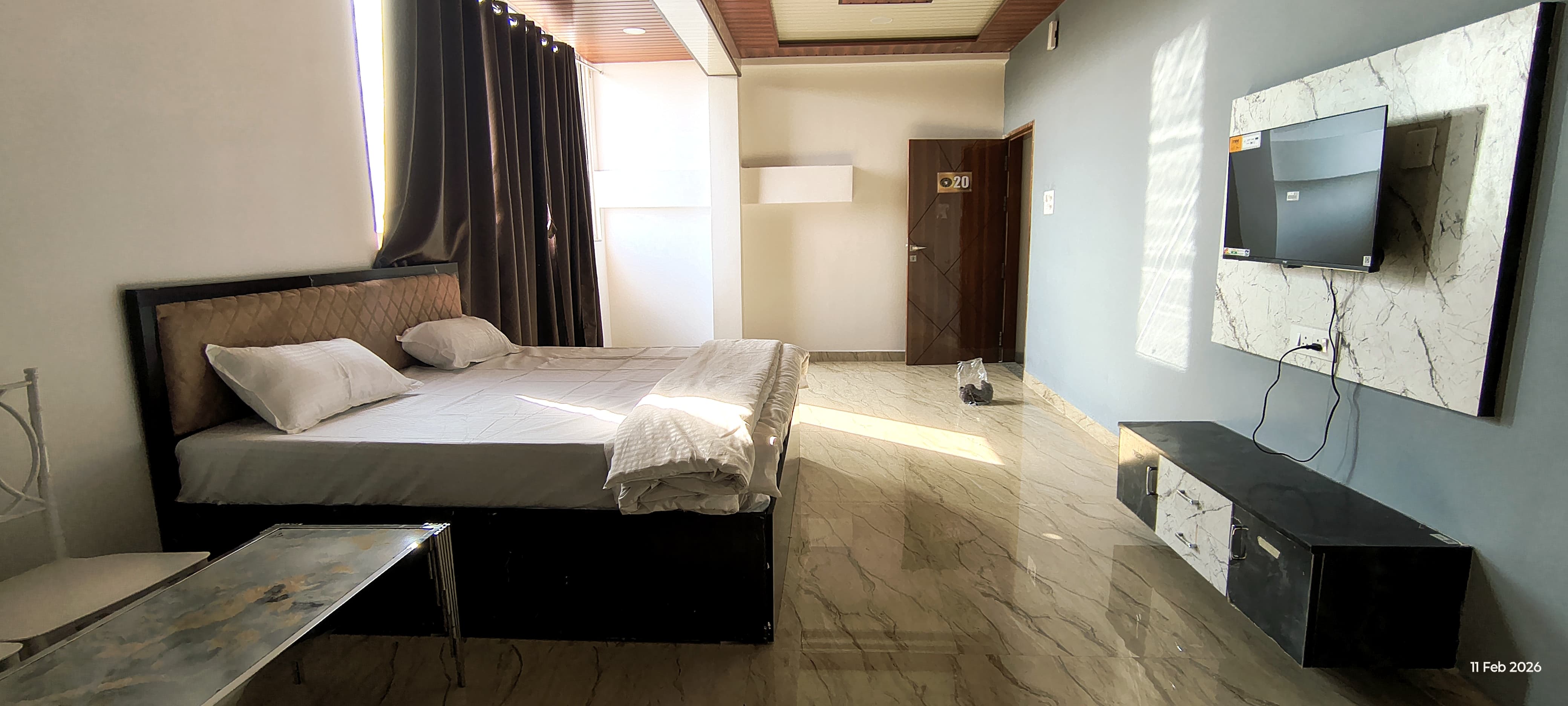 Guest room with bed and television